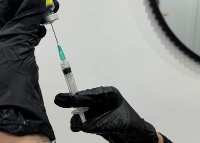 Professional injector at Aesthetics By Anna, Southport, England, GB, showcasing precision in beauty treatment.