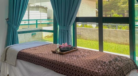 Relaxing spa room at Srijeda Putrajaya, Putrajaya with green views and soothing decor.