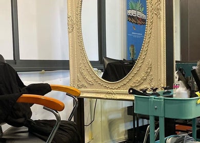 Srijeda Putrajaya salon interior with ornate mirror and styling chair in Putrajaya, Wilayah Persekutuan Putrajaya, MY.