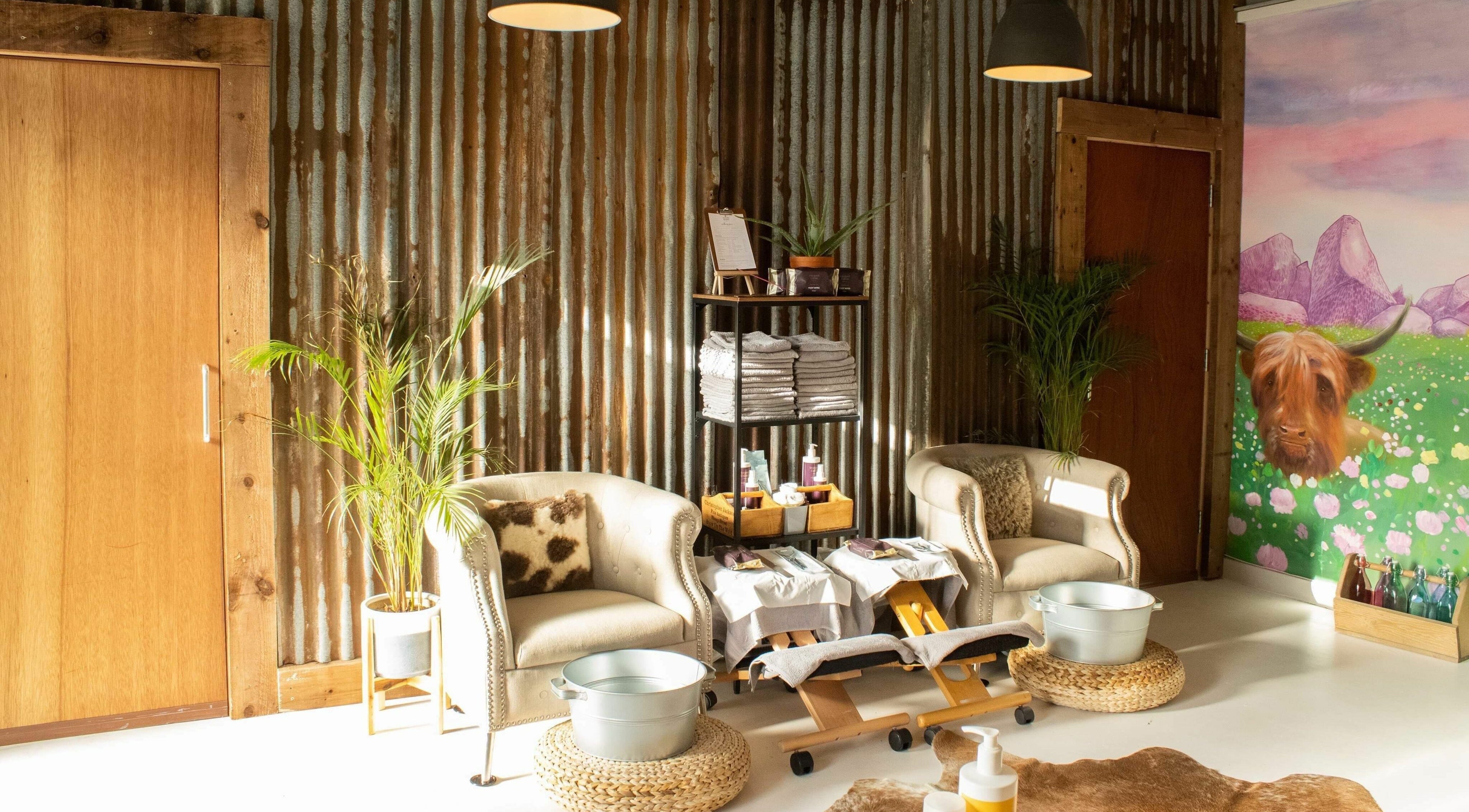Cozy seating area in Michelle Denham Beauty and Skin Clinic, North Berwick, Scotland, GB with rustic decor.