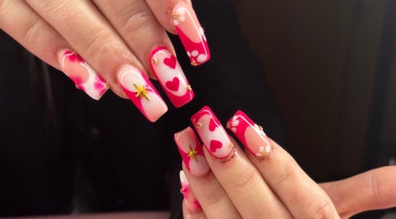 Stylish red and pink heart-themed manicure at Borscz Beauty, Gowrie, Australian Capital Territory, AU.