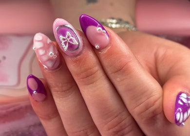 Elegant nail art with purple and pearl accents at Borscz Beauty, Gowrie, Australian Capital Territory, AU.