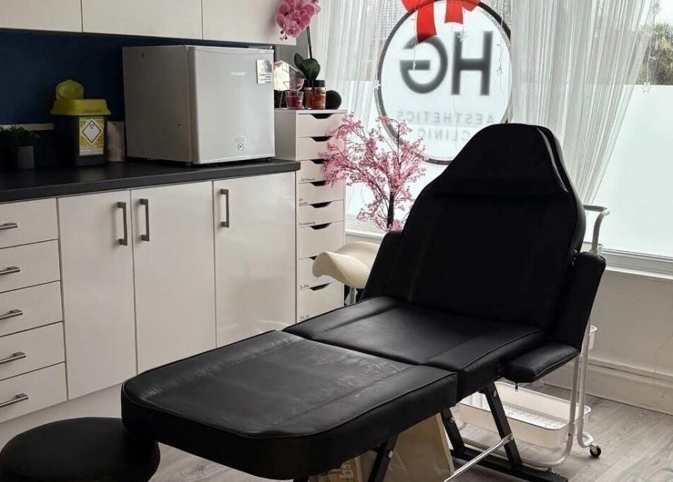 Elegant treatment room at B.A Aesthetics, Lyneham, England, GB, featuring modern furnishings and ambient decor.