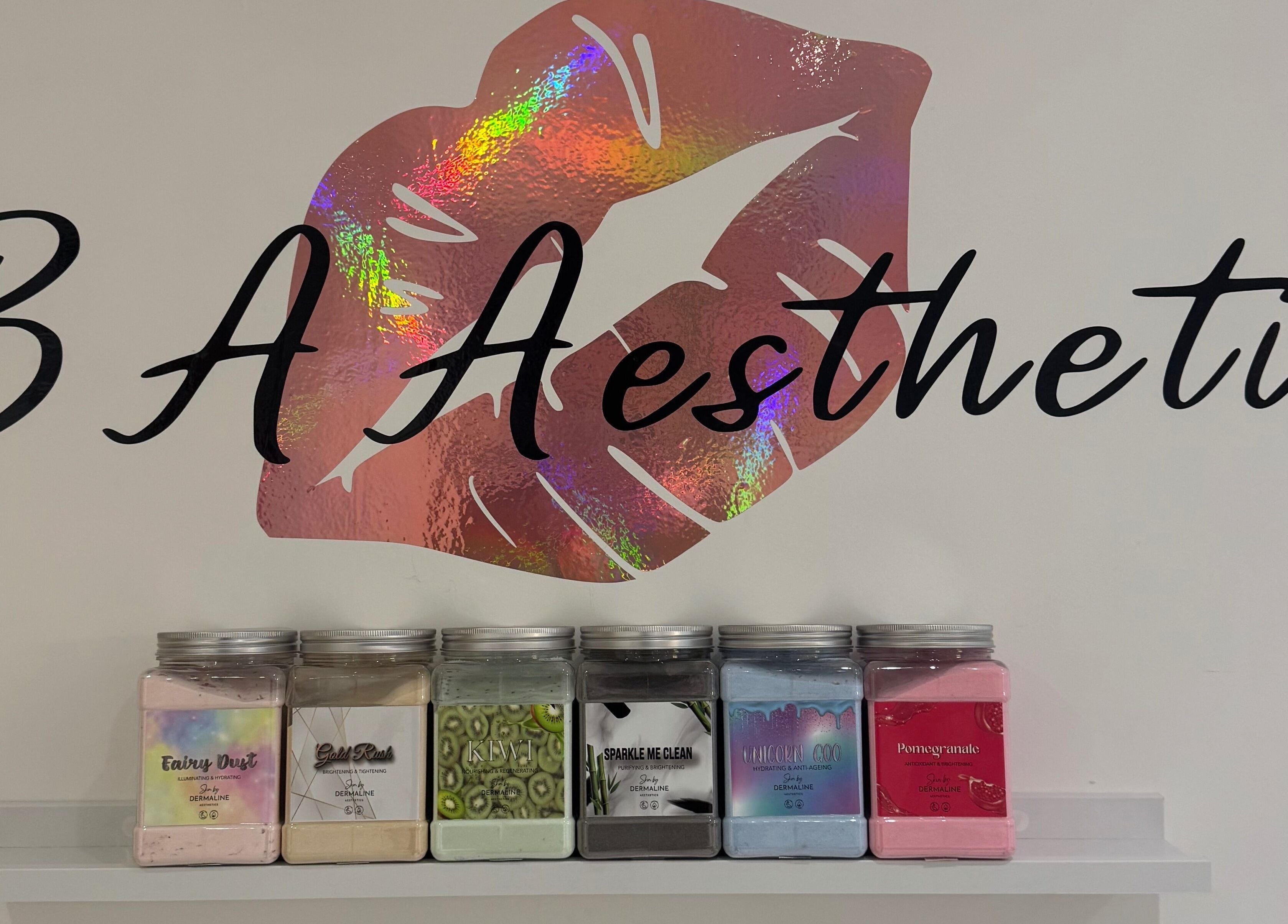 Vibrant B.A Aesthetics logo with beauty product jars at Lyneham, England, GB.