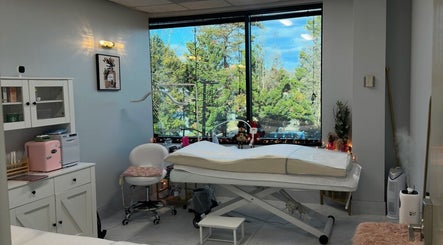 Treatment room at Beauty Blossom in Woodbridge, Virginia, US with a serene view and modern furnishings.