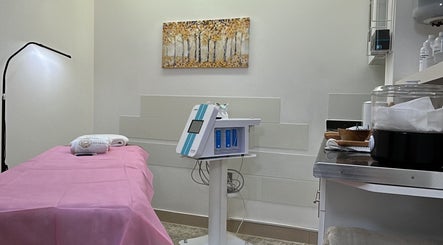 Rio Edition wellness room in London, England, GB with modern decor and treatment bed.
