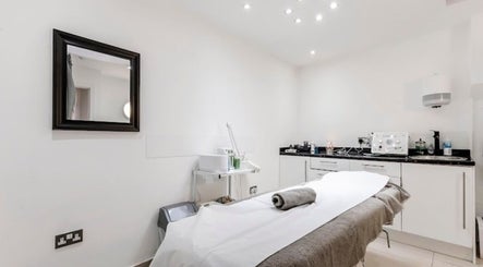 Luxurious treatment room at Rio Edition in London, England, GB, featuring a neatly arranged massage table.