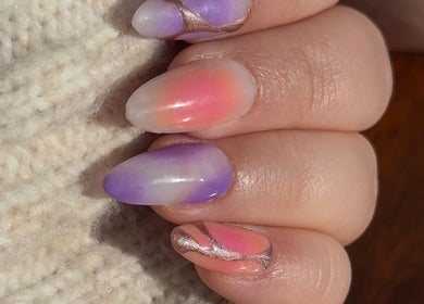 Colorful nail art with pink and purple at Cherry Aura Nails, Nottingham, England, GB.
