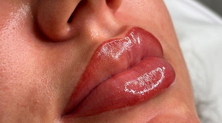 Close-up of glossy lips after beauty treatment at Clinic Muse SPMU, Hamilton, Scotland, GB.