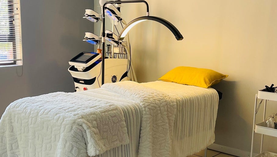 Relaxing treatment room at BodyBlitz Therapy, Johannesburg, Gauteng, ZA with cozy bedding and modern equipment.