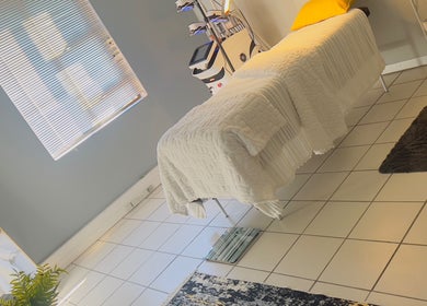 BodyBlitz Therapy massage room in Johannesburg, Gauteng, ZA with treatment bed and serene decor.