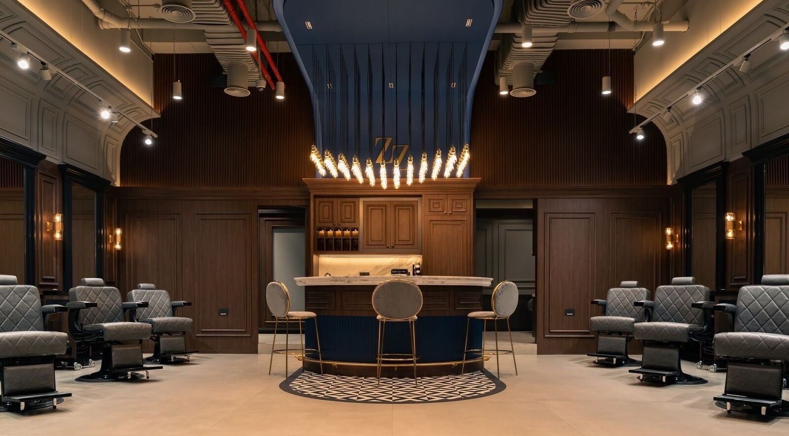 Elegant interior of Paparazzi Men’s Salon in Bur Dubai, Dubai, AE featuring plush barber chairs and modern design.