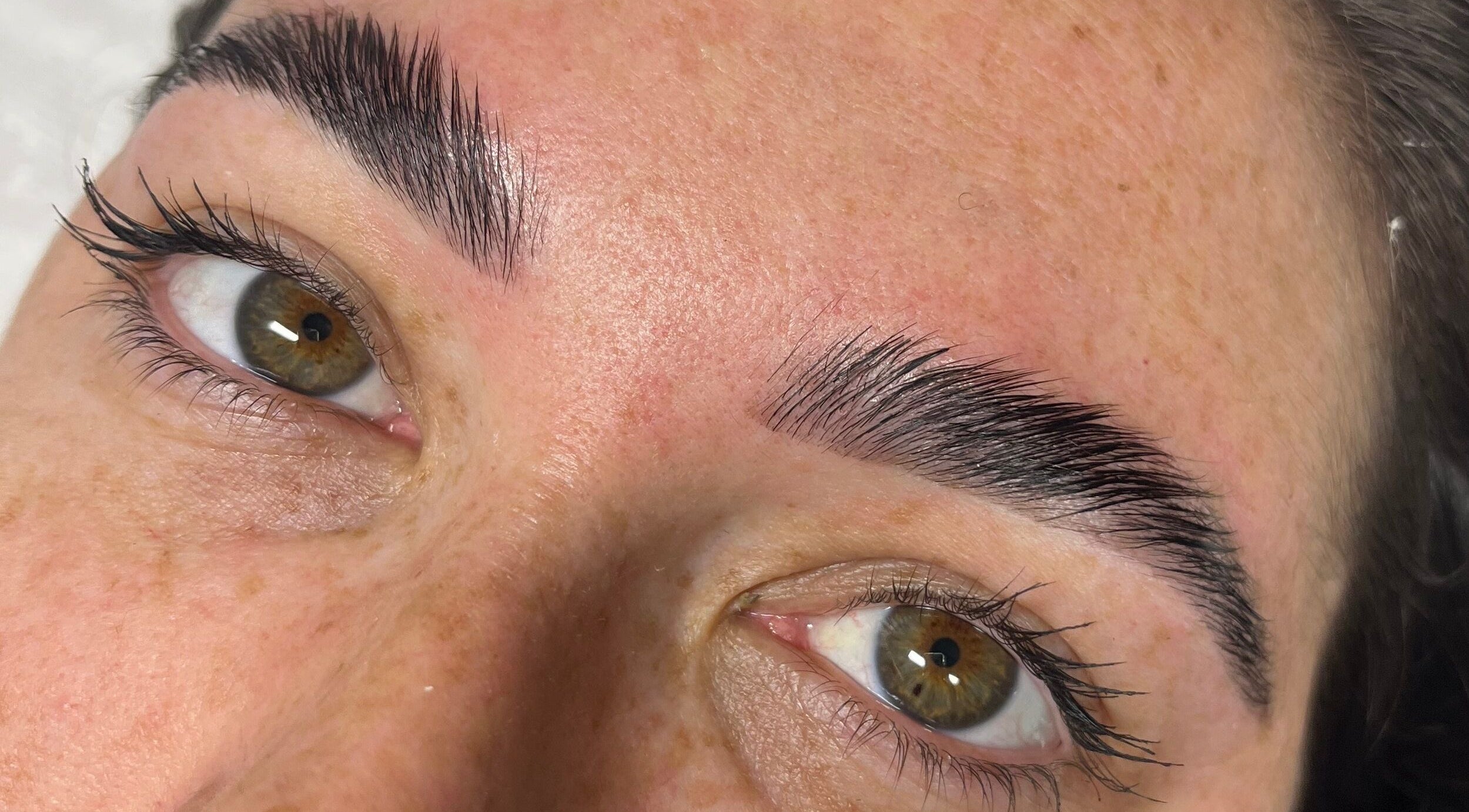 Perfectly groomed eyebrows at Lust Beauty Bar, Redland Bay, Queensland, AU, showcasing precision skills.