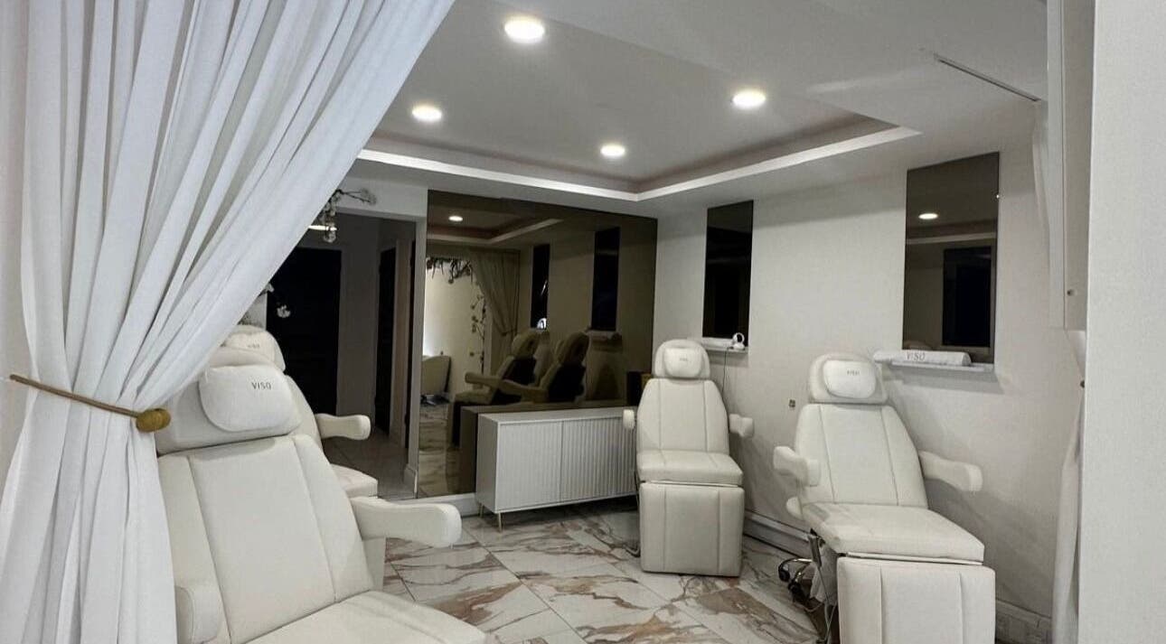 Elegant treatment room at Olive's Beauty & Tanning - Chislehurst, Chislehurst, England, GB with plush seating.