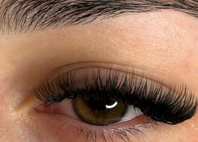 Close-up of eye with elegant eyelash extensions at Olive's Beauty & Tanning - Beckenham, England, GB.