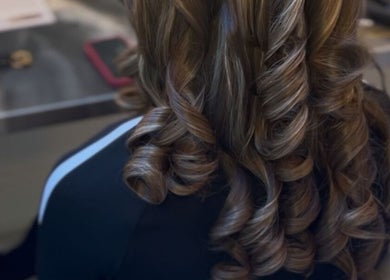 Stylish curled hairstyle at Olive's Beauty & Tanning - Beckenham, Beckenham, England, GB.
