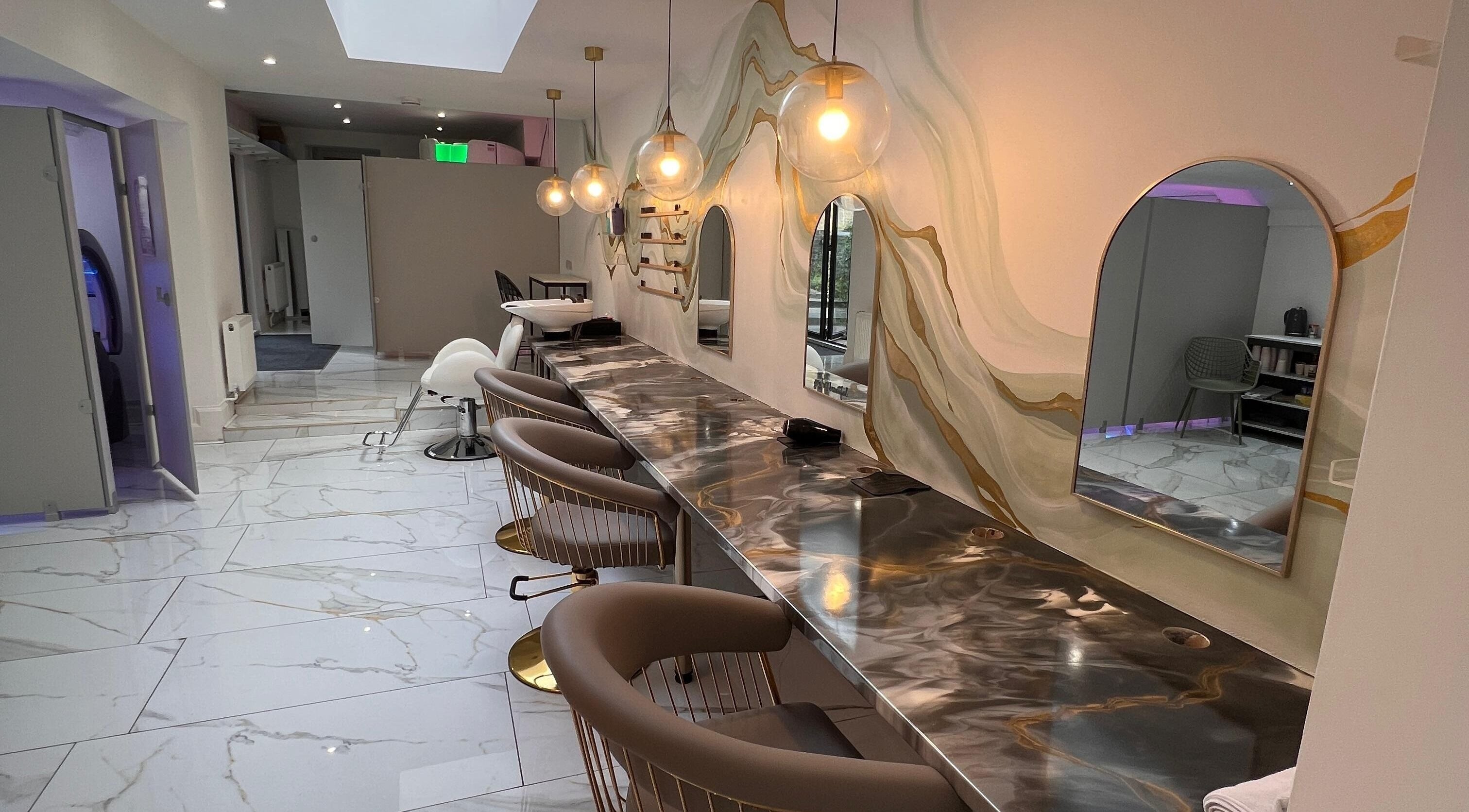 Stylish interior at Olive's Beauty & Tanning - Beckenham with chic seating and decor. Beckenham, England, GB.