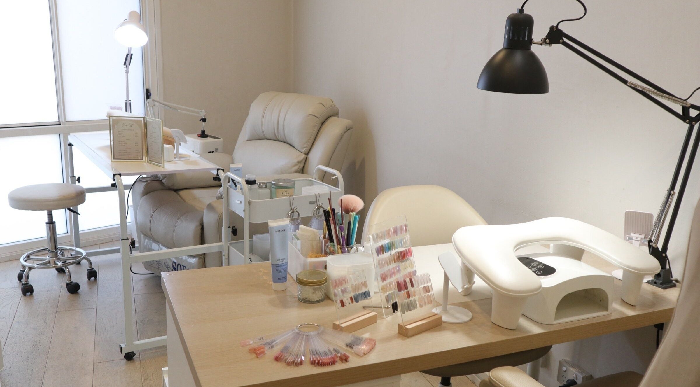Relaxing interior at Care Nails Japanese Nail Salon, Newtown, New South Wales, AU. Cozy manicure station with modern tools.