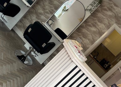 Modern salon chairs and decor at Hair by Hannah, Hinckley, England, GB.