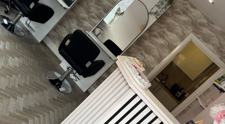 Modern salon chairs and decor at Hair by Hannah, Hinckley, England, GB.