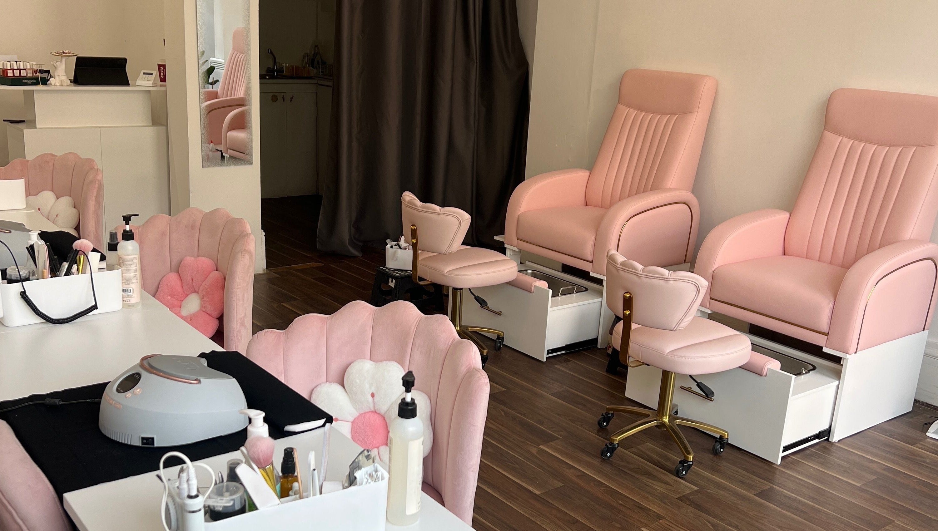 Elegant pink spa chairs at Pinky Bar, Bristol, England, GB. Ideal for relaxation and beauty treatments.