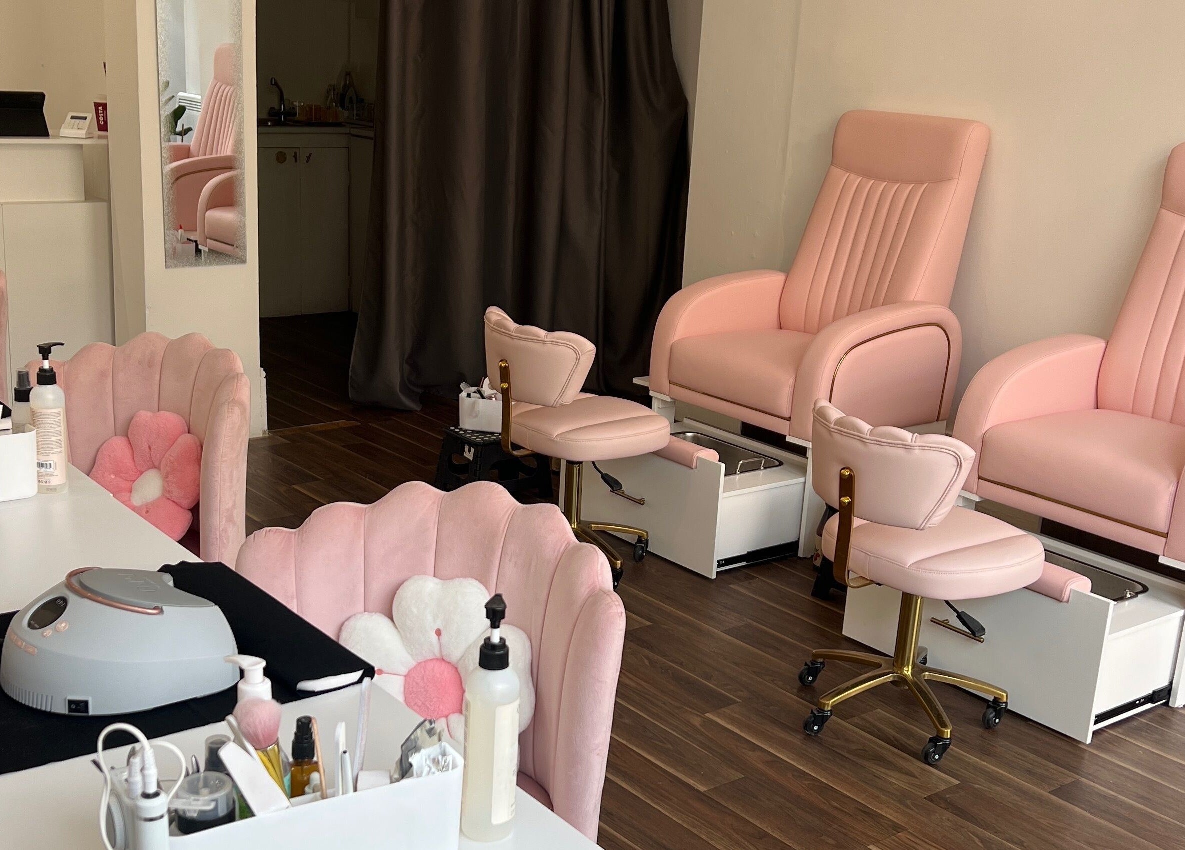 Elegant pink spa chairs at Pinky Bar, Bristol, England, GB. Ideal for relaxation and beauty treatments.