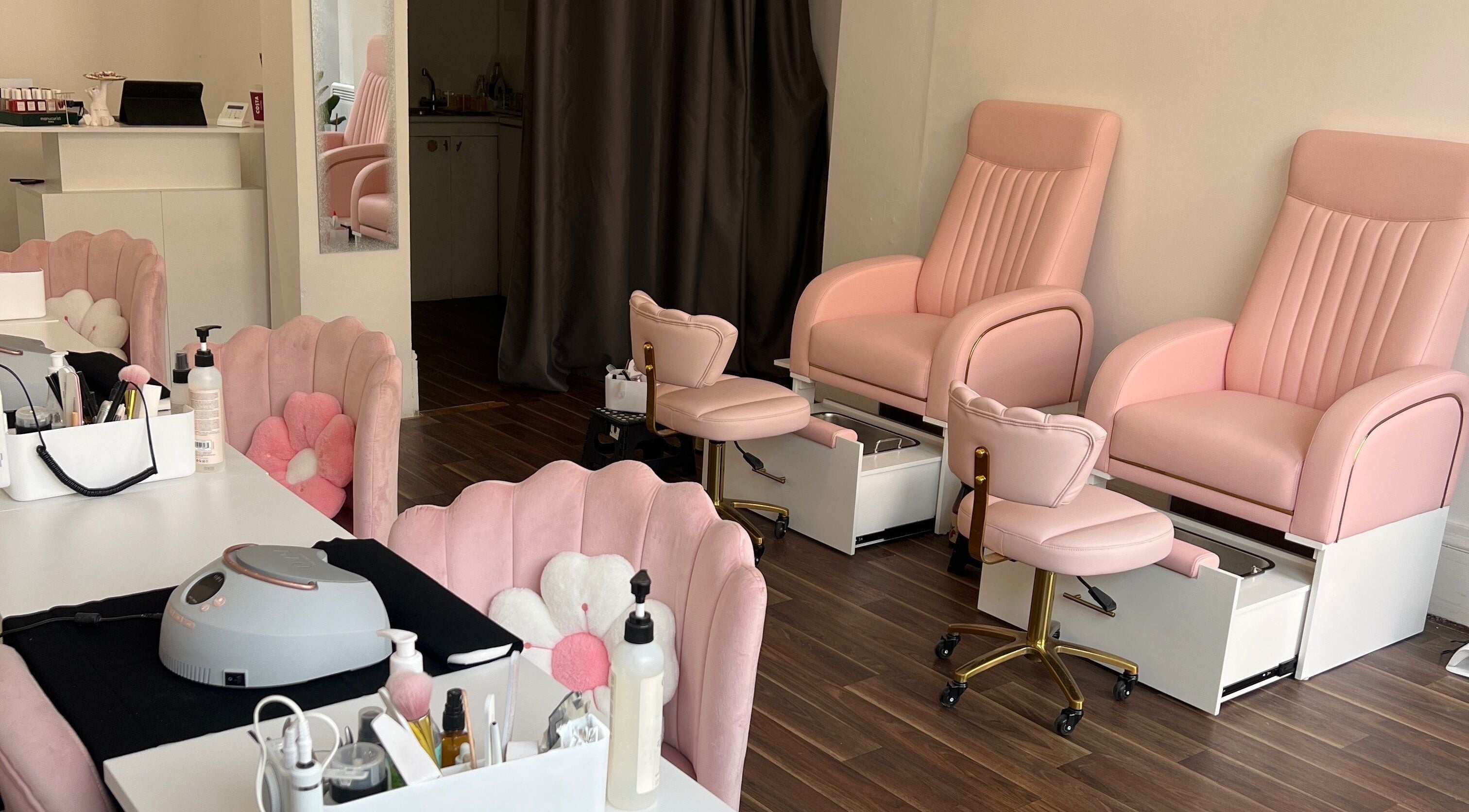 Elegant pink spa chairs at Pinky Bar, Bristol, England, GB. Ideal for relaxation and beauty treatments.