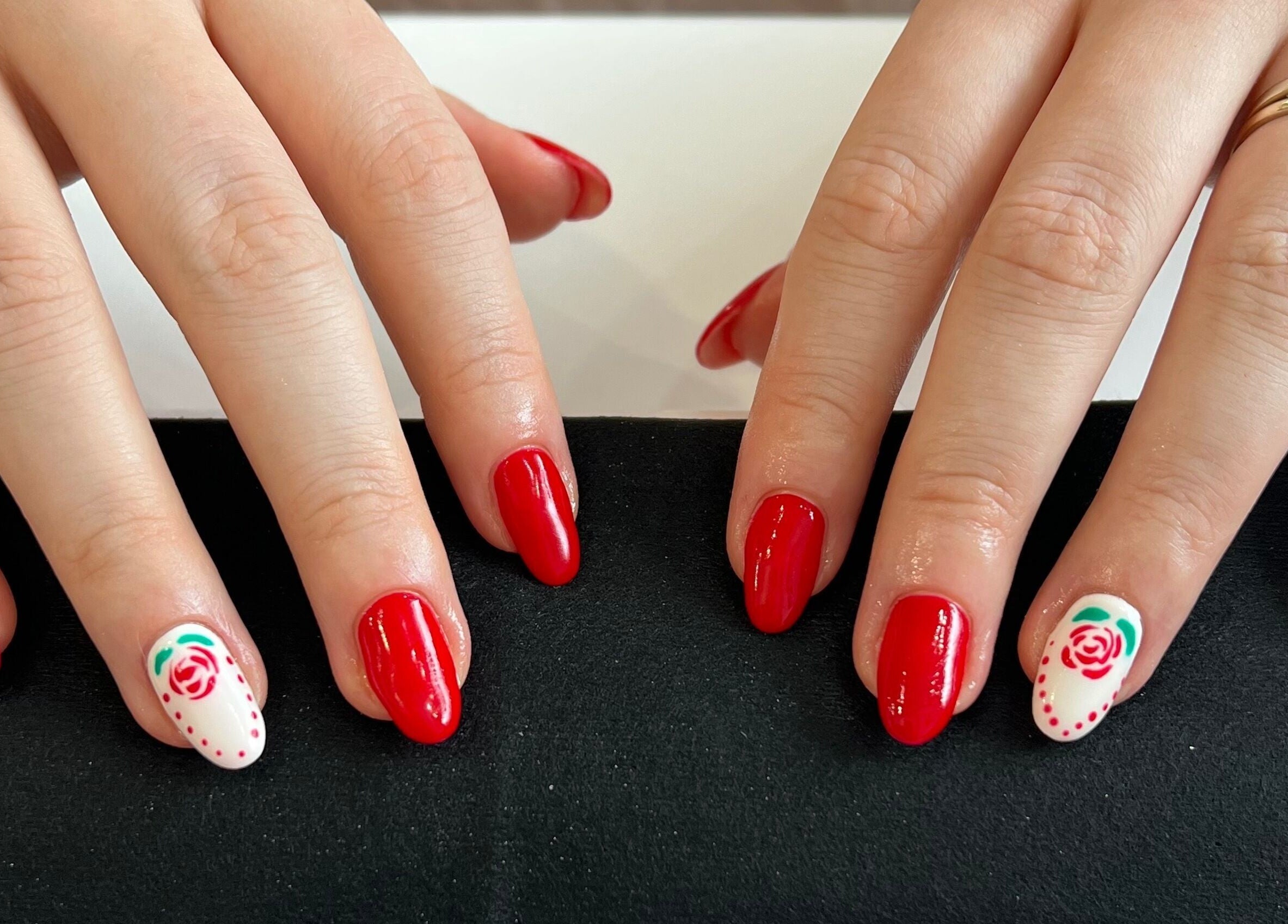 Elegant red and rose nail art from Pinky Bar in Bristol, England, GB.