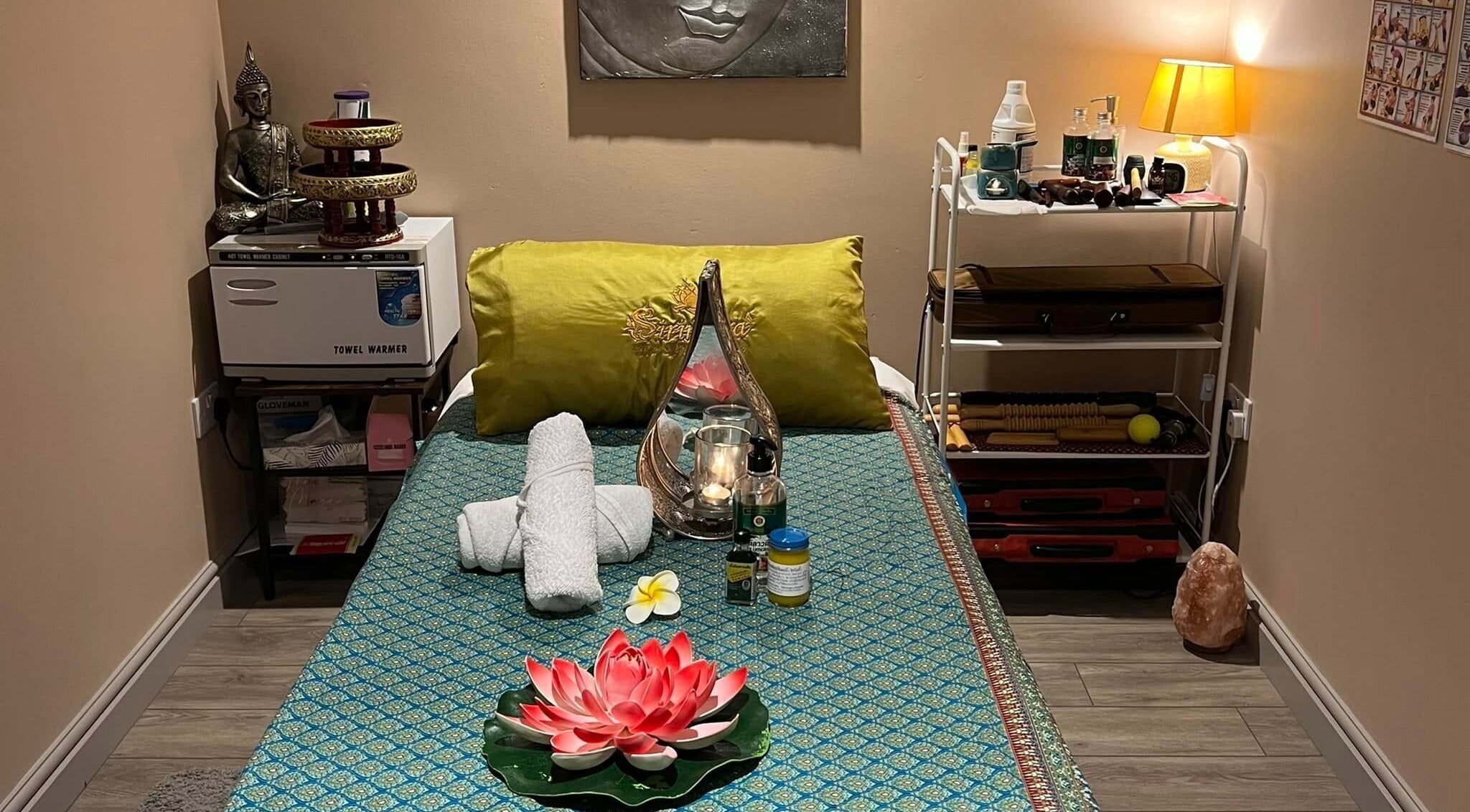 Tranquil massage setup at Sirinthra Thai Massage Therapy, Beverley, England, GB with elegant decor and calming ambiance.