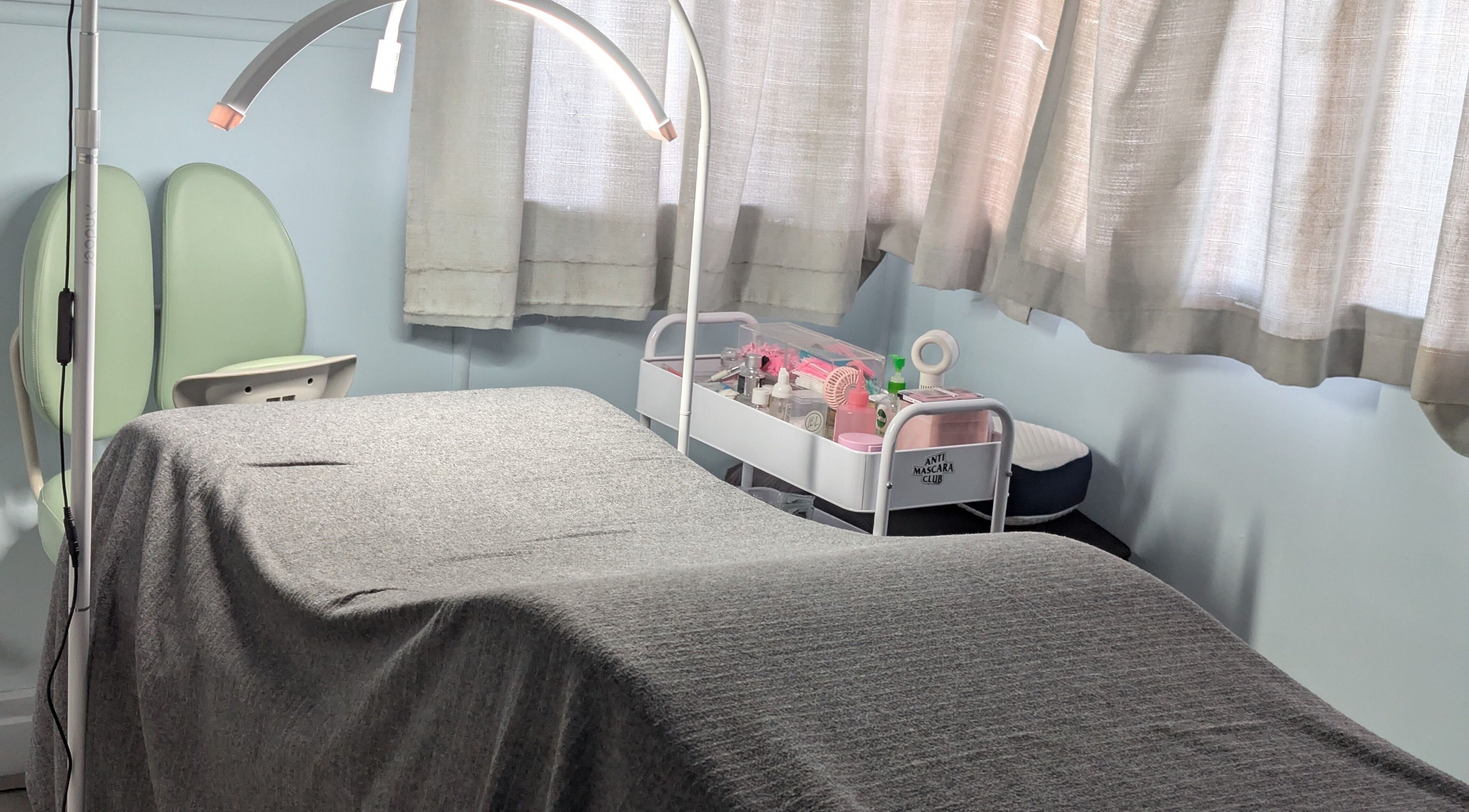Lashes and beauty by Reanna treatment room in Carina, Queensland, AU with cozy spa bed and tools.