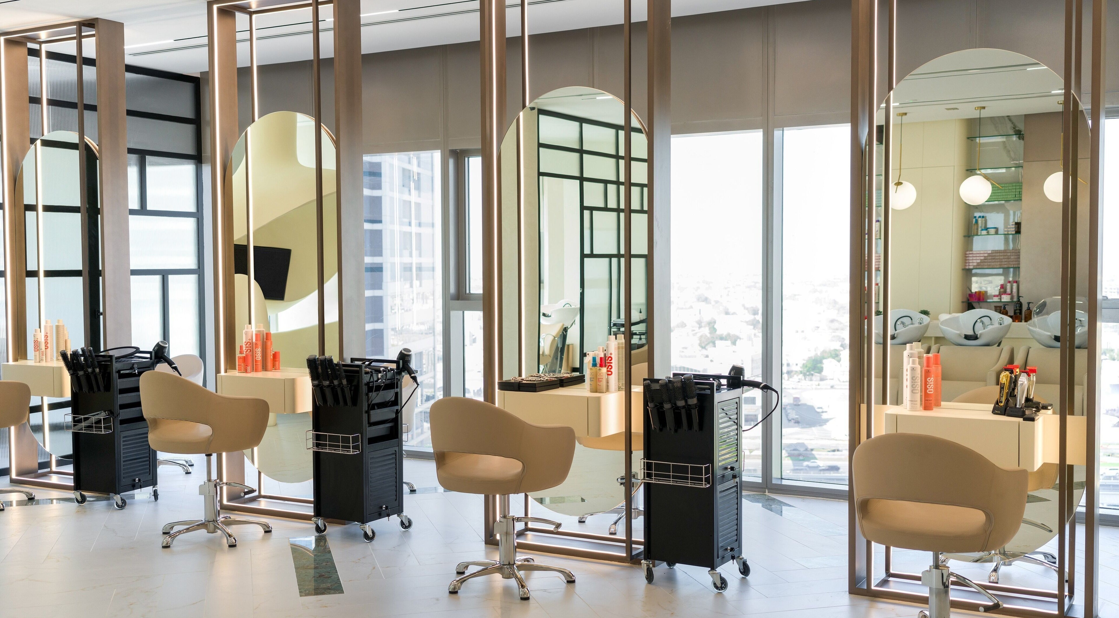 Modern styling stations at Anahita Beauty Salon, Dubai, Dubai, AE. Bright and elegant salon interior.