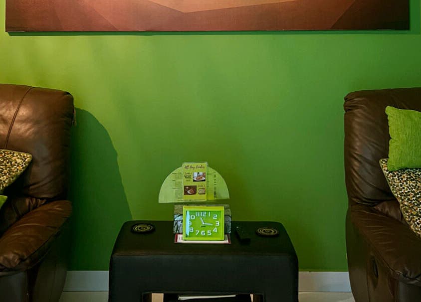 Cozy relaxation nook with leather chairs at The Spa, Díli, Dili, TL.