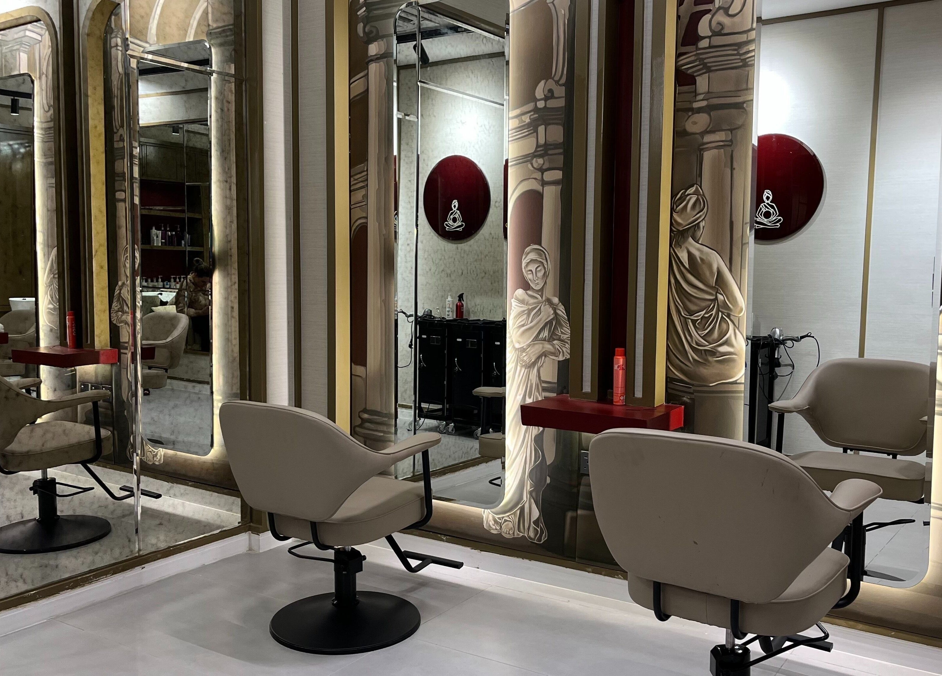 Elegant salon chairs and mirrors at Myalo Spa, Riyadh, Riyadh Province, SA, reflecting luxury interiors.