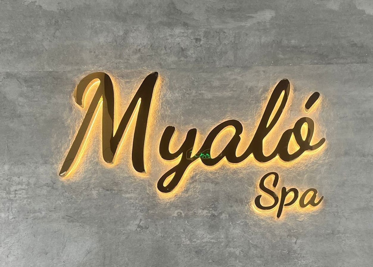 Illuminated Myalo Spa sign against a concrete wall in Riyadh, Riyadh Province, SA.