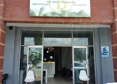 The Beauty Salon & Company storefront at Roodepoort, Gauteng, ZA. Inviting entrance with modern decor.