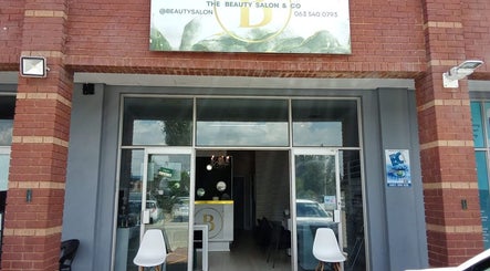 The Beauty Salon & Company storefront at Roodepoort, Gauteng, ZA. Inviting entrance with modern decor.