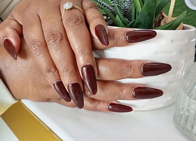 Stylish deep red nails at The Beauty Salon & Company in Roodepoort, Gauteng, ZA.