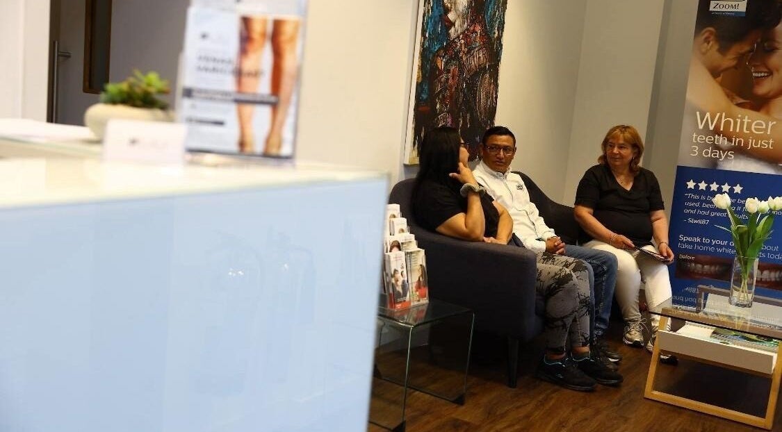 Visitors in Lily Aesthetic and Medical Group's relaxing London waiting area.