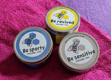 Three tins of massage waxes at RENUMI Mind-Body Therapies & Coaching, Musselburgh, Scotland, GB.