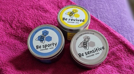 Three tins of massage waxes at RENUMI Mind-Body Therapies & Coaching, Musselburgh, Scotland, GB.