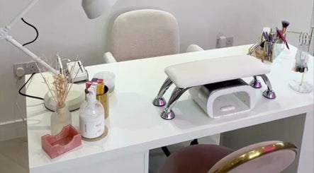 Nail station at Lulabells Bristol in Bristol, England, GB with stylish tools on a white desk.
