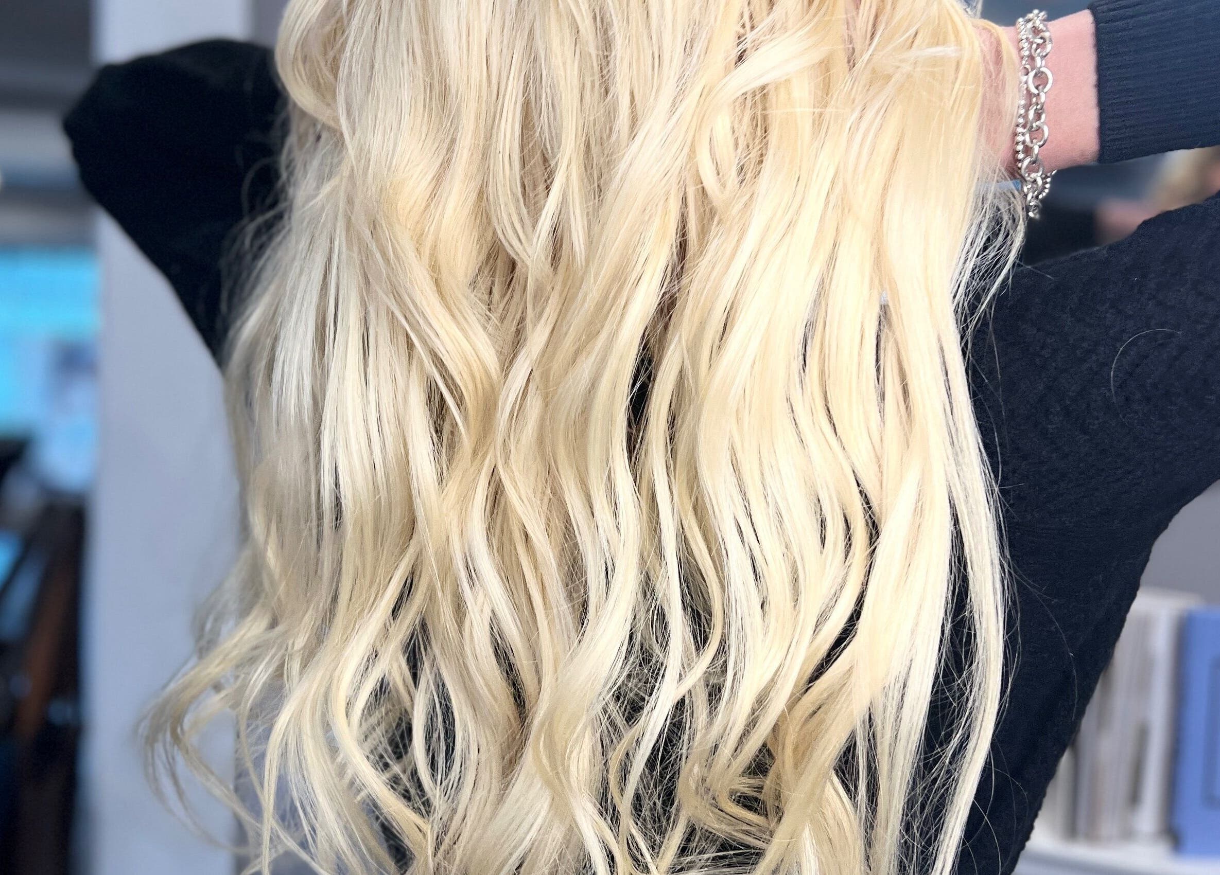 Blonde waves styled at Paris Salon, Ridgefield, Connecticut, US. Experience luxury hair care.