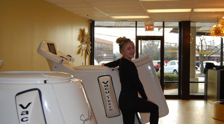 A woman enjoying a wellness treatment at RED HOT ZONE, Oakbrook Terrace, Illinois, US.