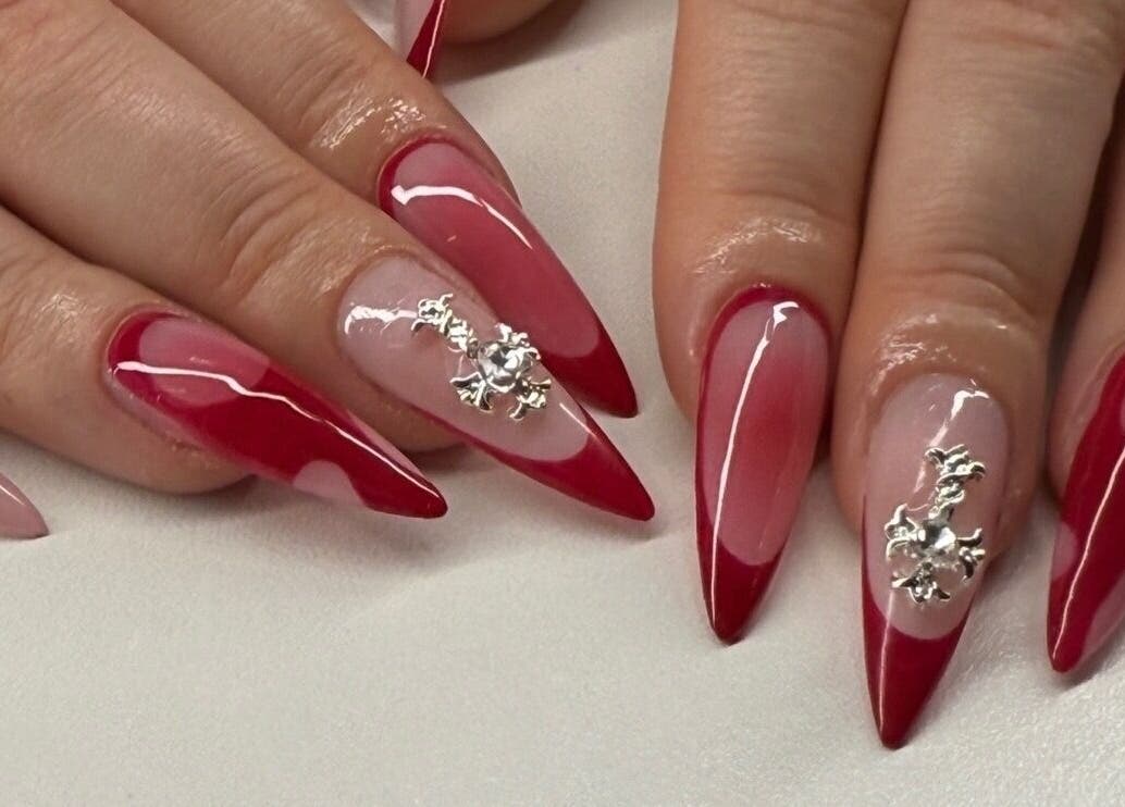 Stunning red nail art with intricate designs at Breezynailss, Melbourne, Victoria, AU.