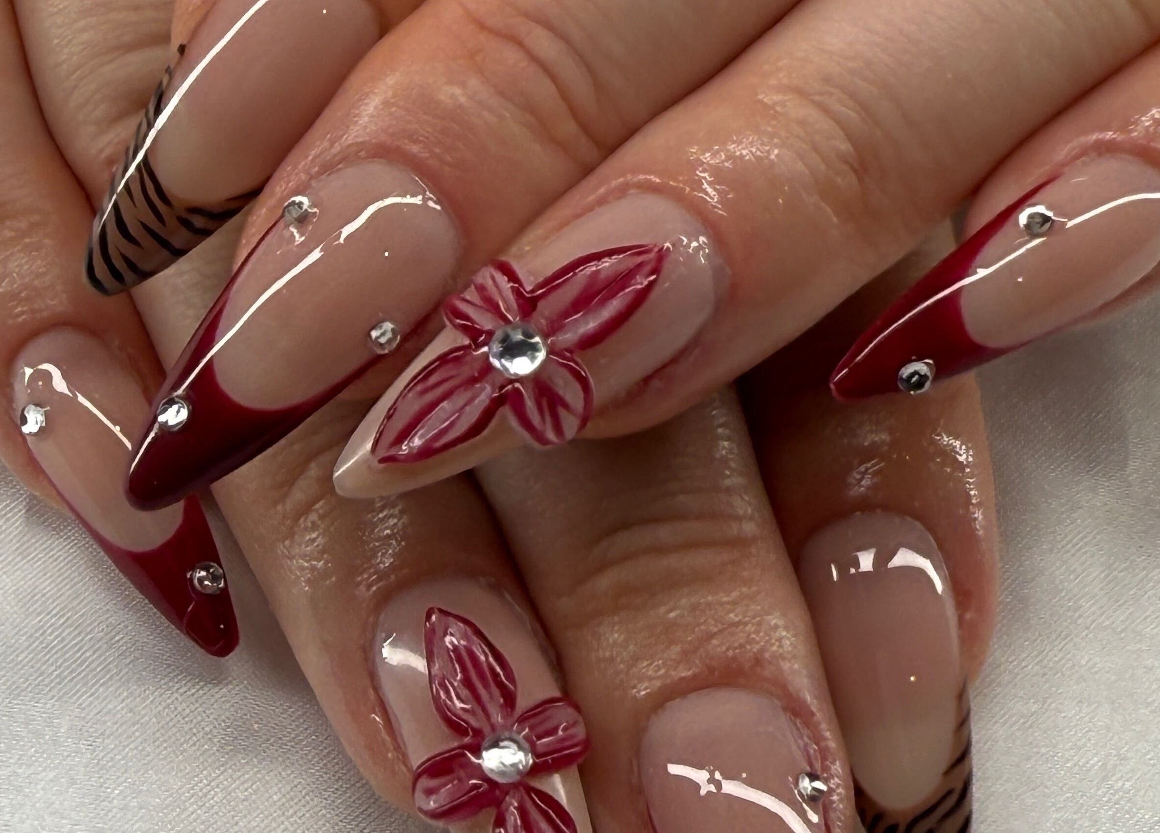 Intricate red floral nail design at Breezynailss, Melbourne, Victoria, AU.