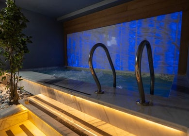 Luxurious pool area at Aurora Spa I أورورا سبا in Riyadh, Riyadh Province, SA featuring calming lights.