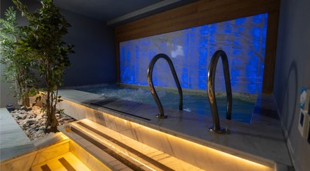 Luxurious pool area at Aurora Spa I أورورا سبا in Riyadh, Riyadh Province, SA featuring calming lights.