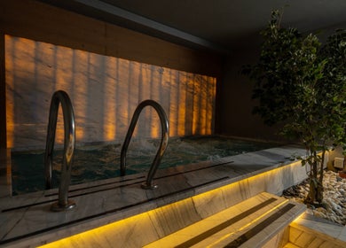 Luxurious spa pool at Aurora Spa I أورورا سبا in Riyadh, Riyadh Province, SA with warm ambient lighting.