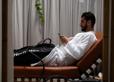 Man enjoying a serene massage at Aurora Spa I أورورا سبا, Riyadh, Riyadh Province, SA.