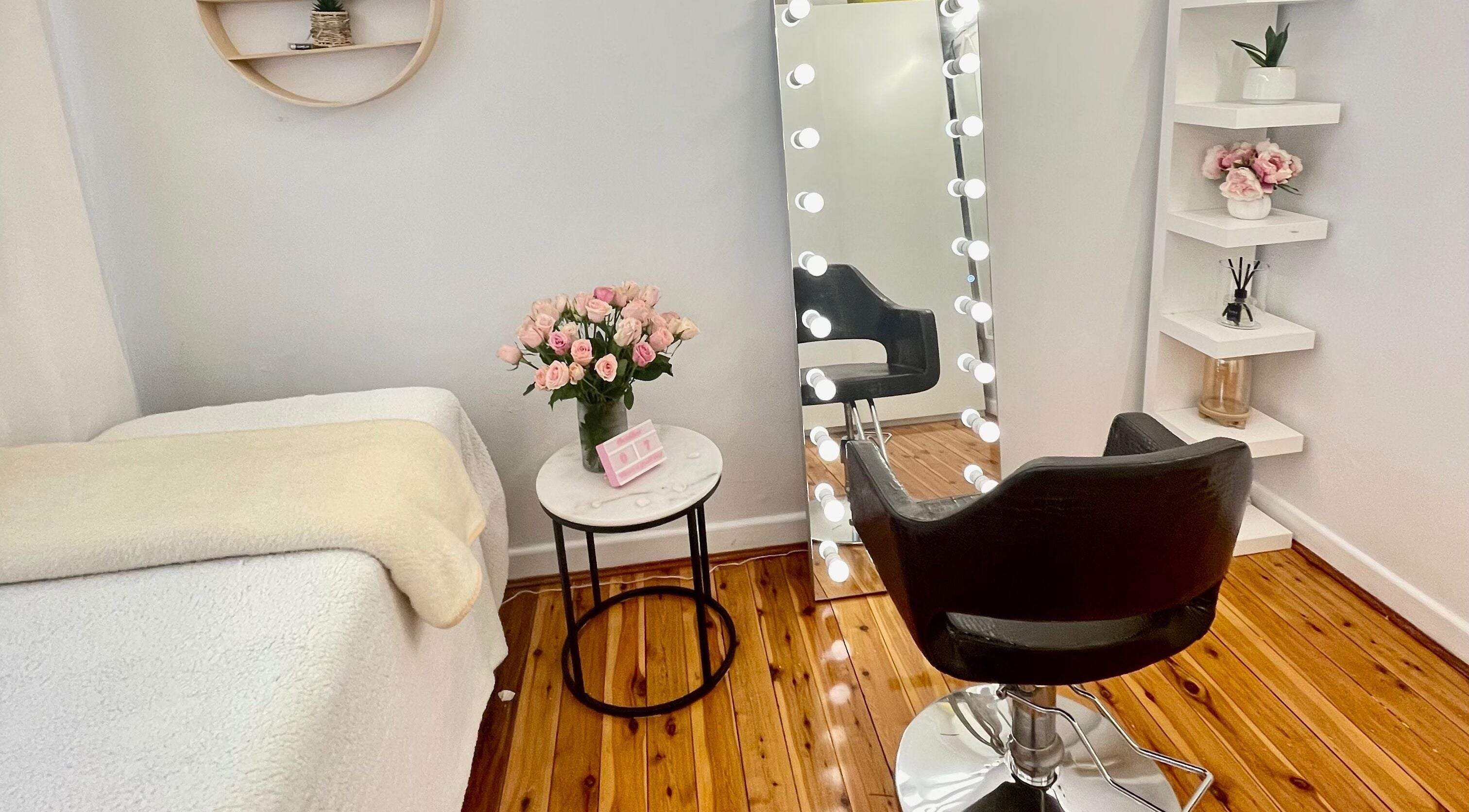 Dully Hairnlash salon interior with a stylist chair and mirror, Dulwich Hill, New South Wales, AU.